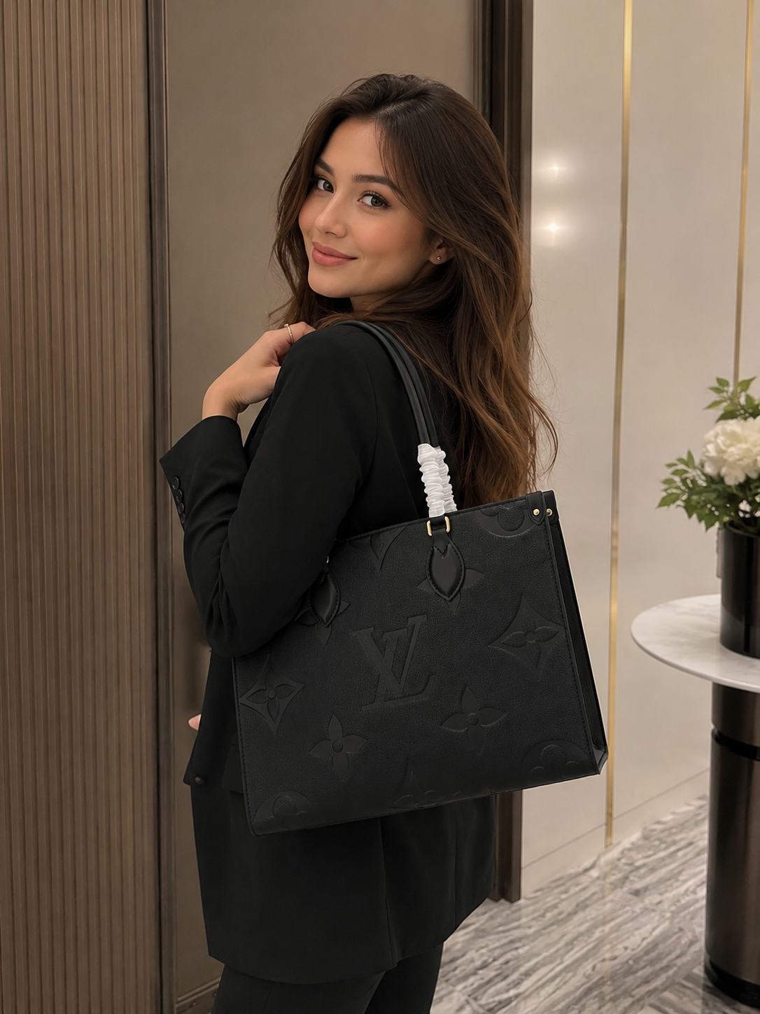 LV OnTheGo PM en piel Monogram Empreinte negro