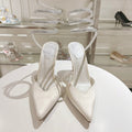 Cleo heels with snake design