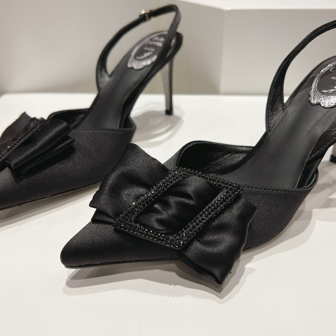 Glass heels with silk bow