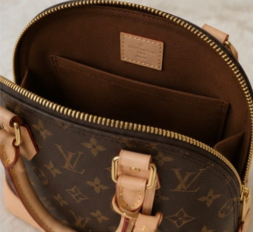Louis Vuitton Alma BB en lona Monogram