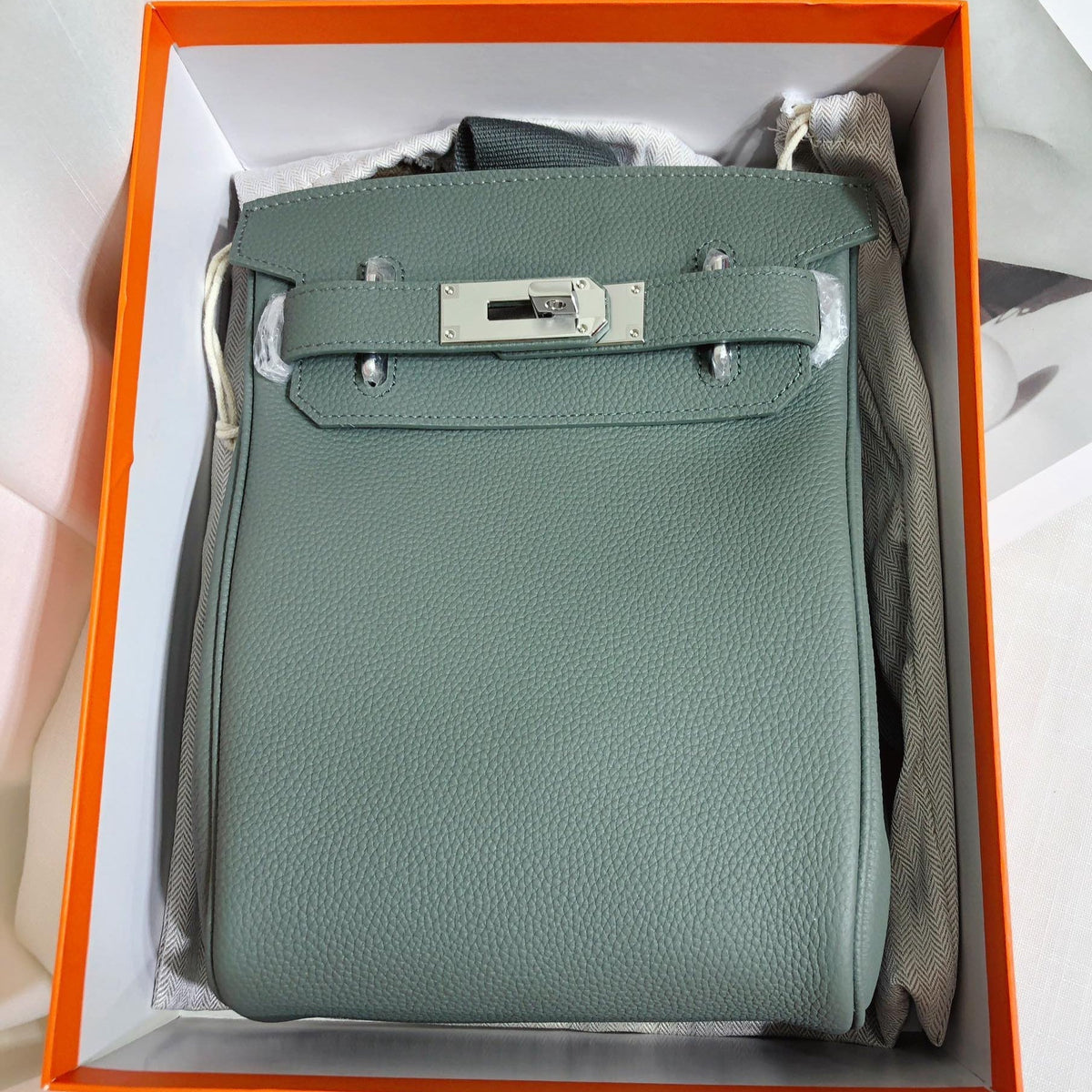Togo Leather Chest Bag